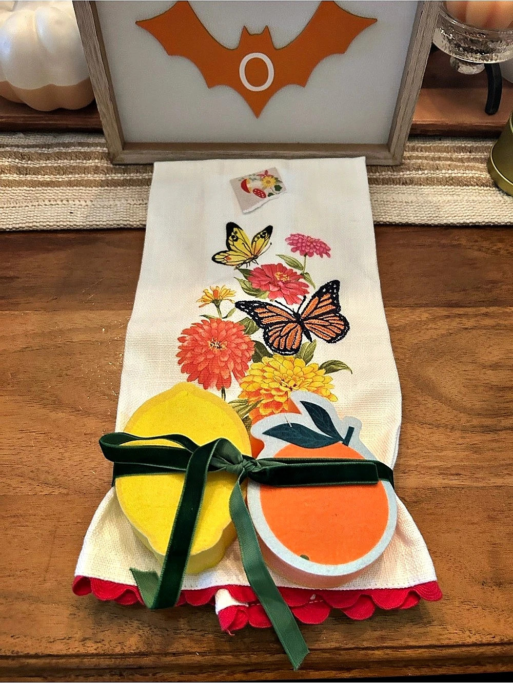 Floral Kitchen Towel Set in White & Orange with Orange and Lemon Sponges.